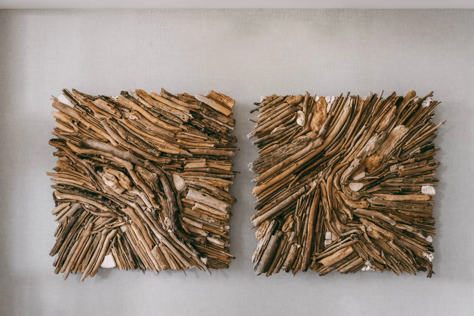Marea Serena: two square driftwood panels installed side by side